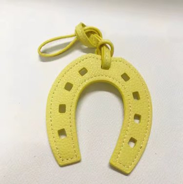 faux leather horseshoe purse charm