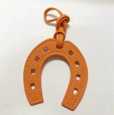 faux leather horseshoe purse charm